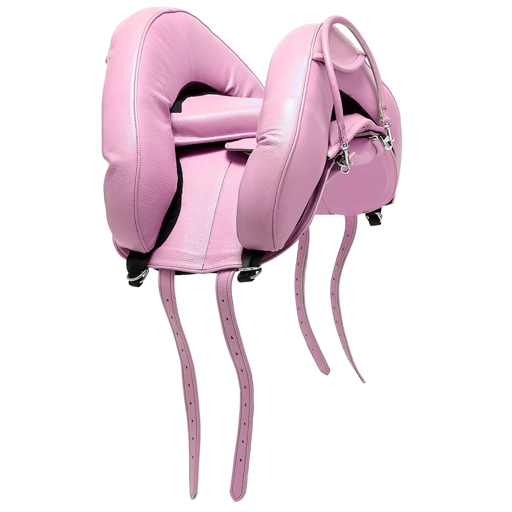 Pink children's riding saddle for birthday parties