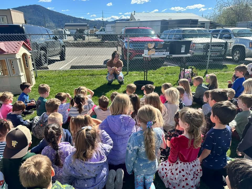 Large group of students engaged at a Tribal Cowboy school visit